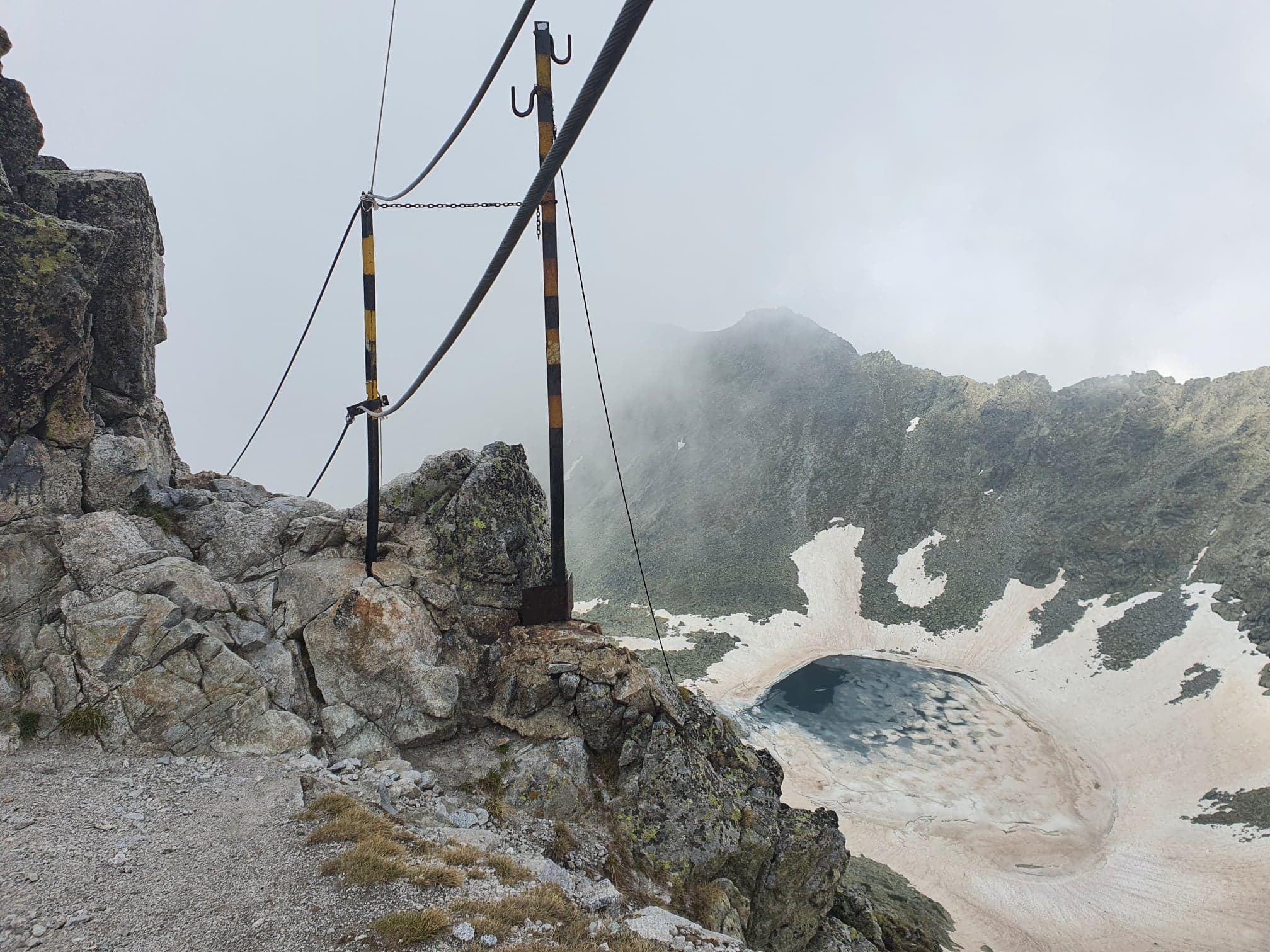 beautiful mountain landscape with ice and rocks and steep hills and lakes
