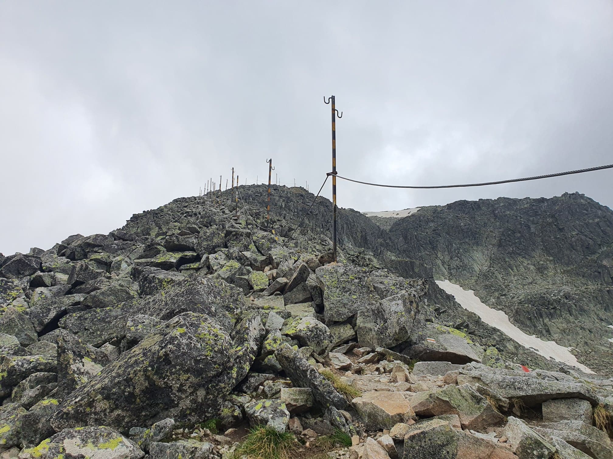 beautiful mountain landscape with ice and rocks and steep hills and lakes