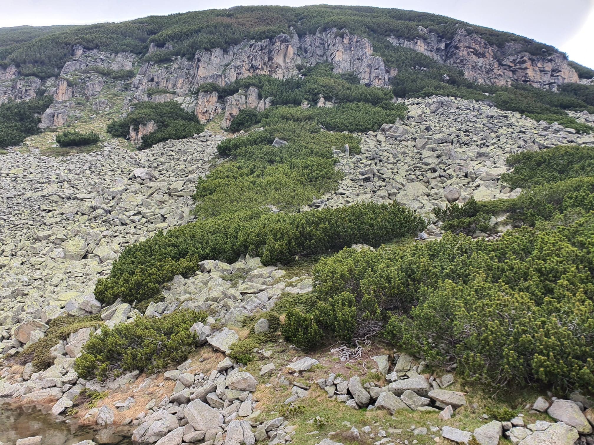 beautiful mountain landscape with ice and rocks and steep hills and lakes