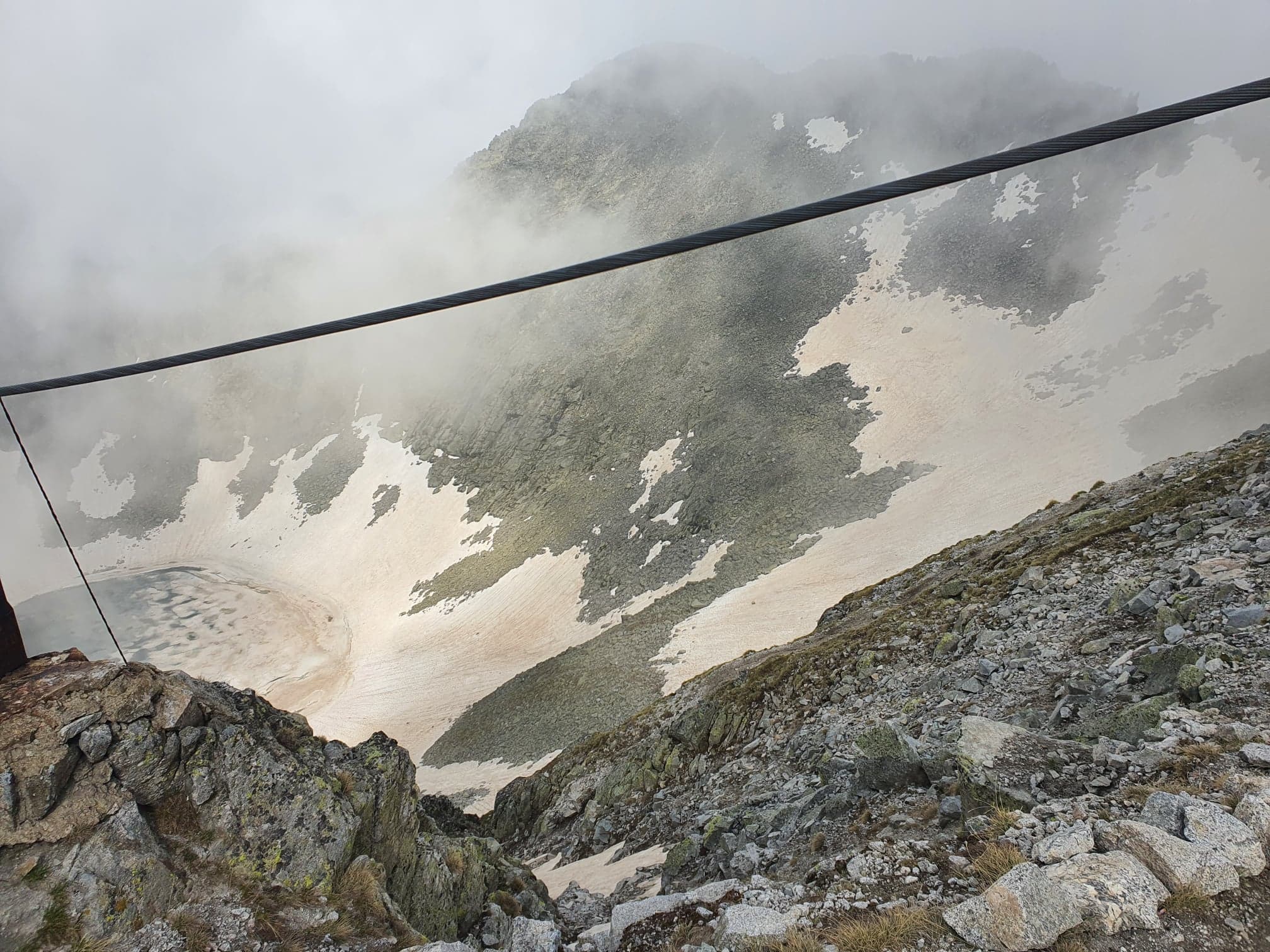 bbeautiful mountain landscape with ice and rocks and steep hills and lakes